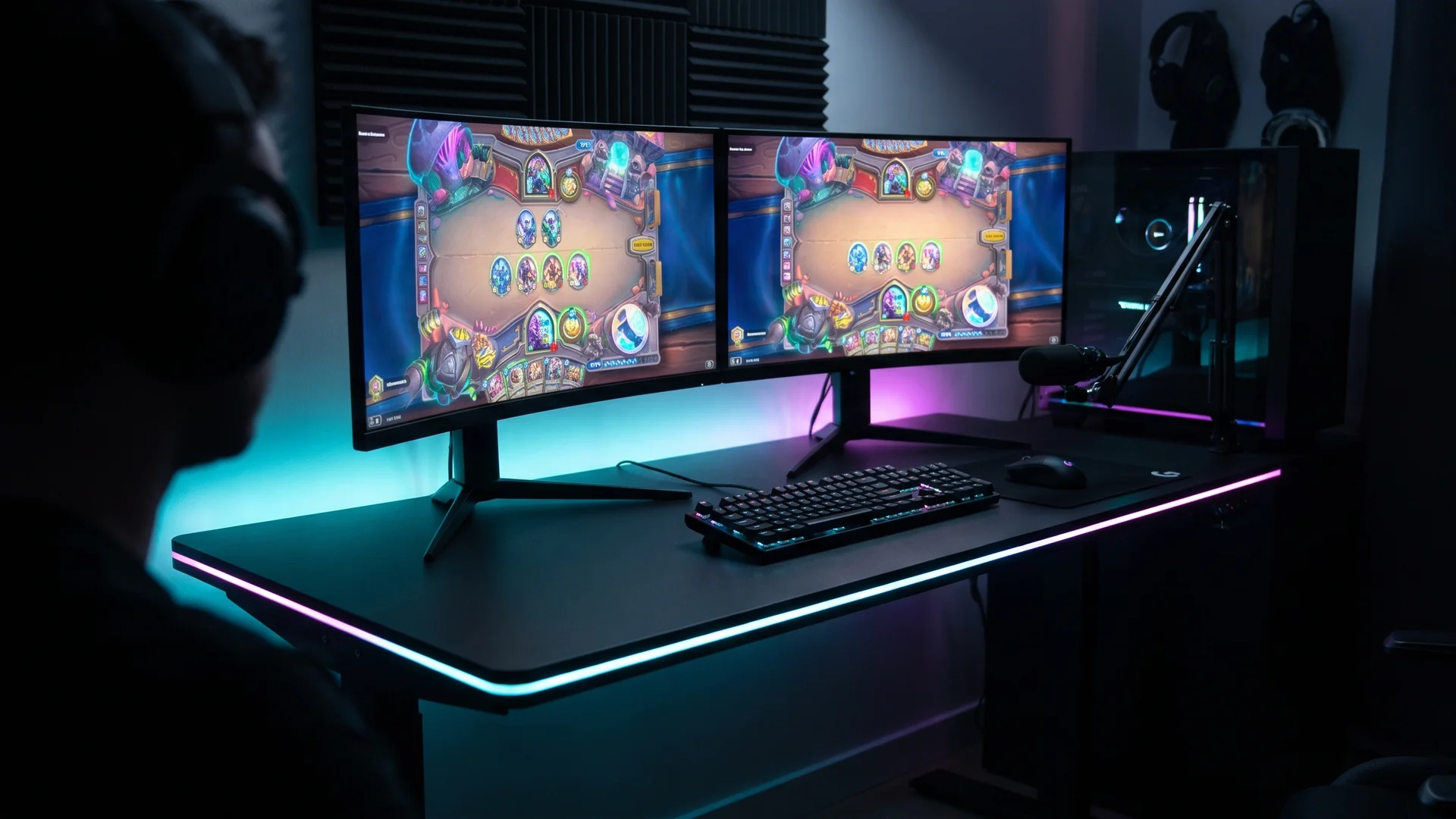 Neon-lit trading-card game interface glowing on a laptop screen at night